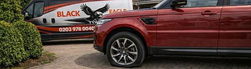 Black Eagle Tyres mobile technician fitting a replacement tyre on a driveway