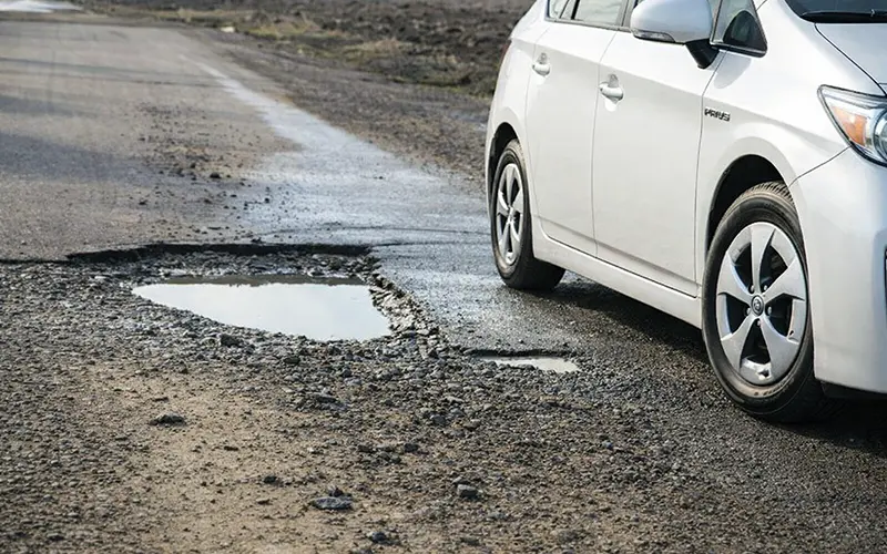 Wheel and tyre damage after a pothole strike